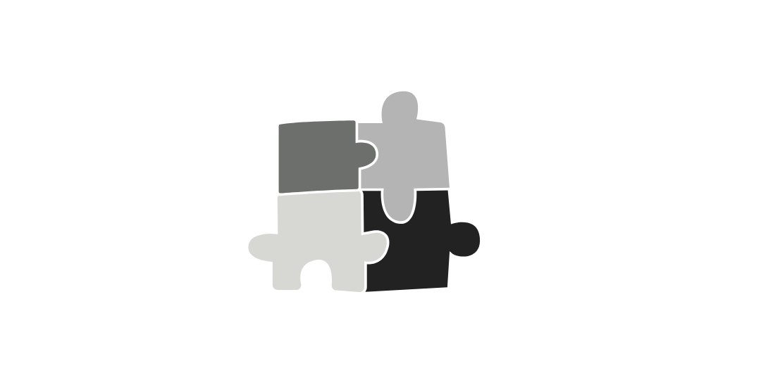 グレーの4つのパズルピースが組み合わさったイラスト。人格形成を表現したデザイン。